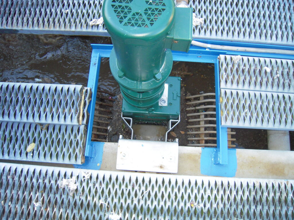 JWC Muffin Monster grinder retrofit installation into headworks of a package plant